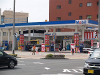  Petrol station attendants waving flags at passing traffic in the hope that they might suddenly change their mind about filling up.