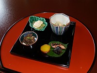  Fifth course - butterbur dressed with miso, boiled tender octopus, simmered Ukai beef with ginger, reduced sweet potato.