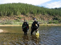  Preparing for the search and recovery dive in the small lake...