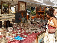  A flea market in Florence - glassware and table pieces.